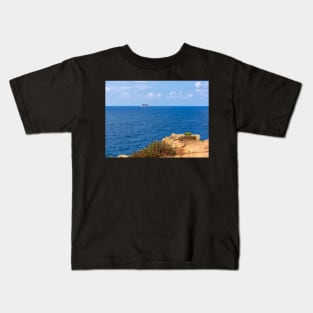 Island in tranquil Mediterranean sea Kids T-Shirt